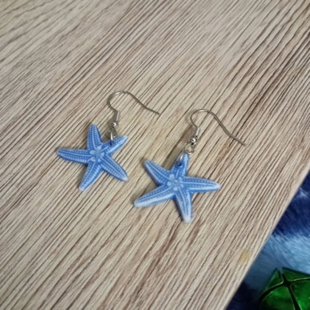 Hand crafted pastel blue statement starfish earrings